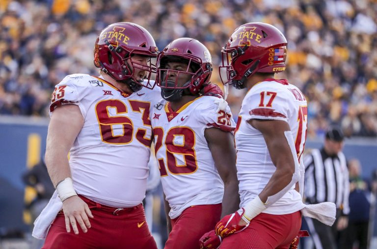ROAD RECAP: Breece Hall breaks through for three TDs in 38-14 win at West Virginia