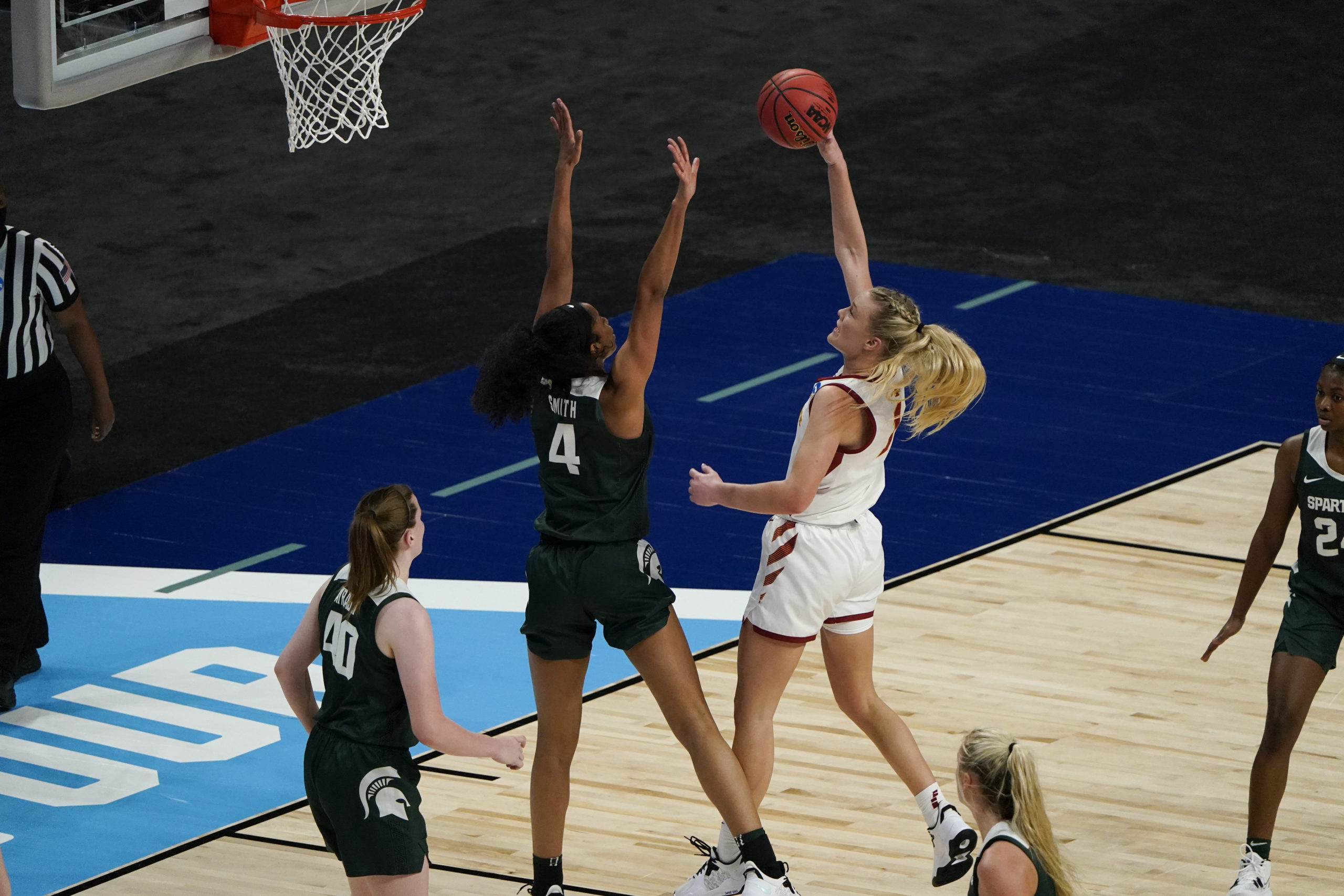 WBB: Madison Wise playing with some extra help over her Shoulder